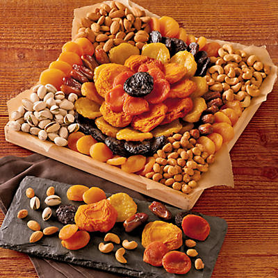 The Dried Fruit and Nut Tray combines the delicate sweet flavors of dried pears, peaches, and apricots picked fresh from the tree with the salty flavor of cashews, pistachios, and honey-roasted peanut