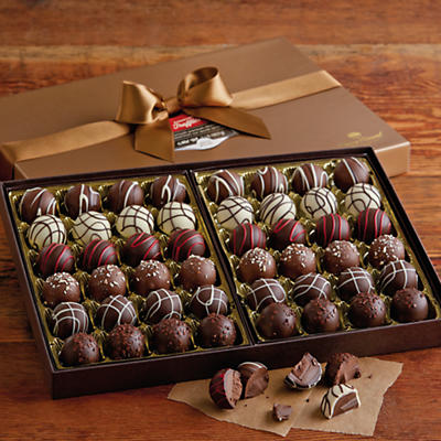 Savor two pounds of our rich, smooth, and beautifully decorated Signature Chocolate Truffles. There's nothing quite like biting into the creamy center of a premium quality gourmet chocolate truffle. W
