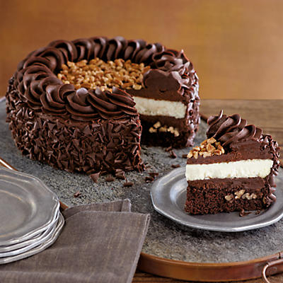 Straight from the Harry & David bakery, it's the Ultimate Chocolate Cake. Enjoy an original specialty cake with a unique combination of decadent flavors. A layer of rich brownie fudge cake and a layer