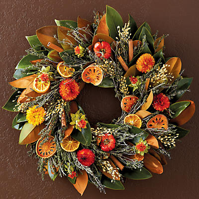 This beautiful and fragrant Magnolia Quince Wreath was handcrafted at family-owned and -operated Creekside Farms. This magnolia leaf wreath is enlivened with slices of quince and orange, cinnamon stic