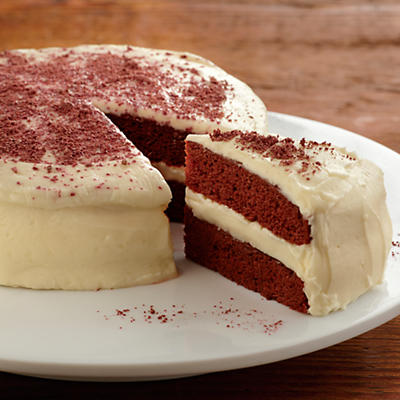 A rich and moist dessert, this two-tiered Red Velvet Cake is crafted according to a traditional recipe that uses sour cream, buttermilk, eggs, sugar, flour, and cocoa. Made in our Southern Oregon bake