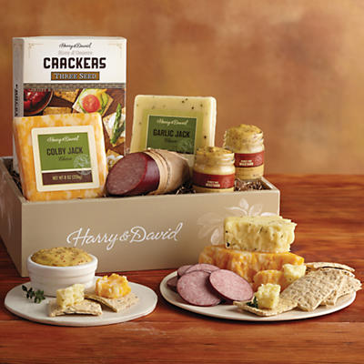 A great selection for any gourmet meat and cheese lover, our flavorful Classic Sausage and Cheese Gift is the ideal combination of premium savory snacks. This selection of Colby and Garlic Jack cheese
