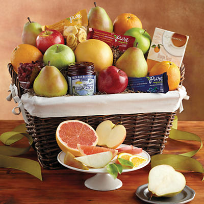 The Deluxe Organic Fruit Gift Basket is brimming with high-quality organic fruit and snacks. From the juicy oranges and apples to the banana chips, dried cranberries, and pear tea, this gift basket is
