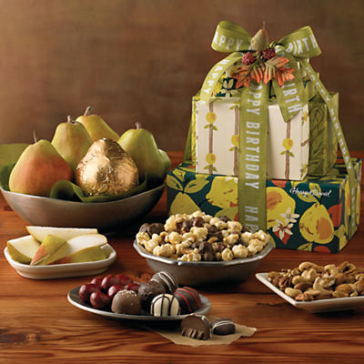 Send sweet, elegant birthday wishes with our Birthday Gift Tower. Featuring a variety of treats crafted in our Southern Oregon candy kitchen, including our perennially popular chocolate cherries, silk