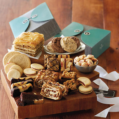 Two bakery boxes brim with delights from our bakery in the Deluxe Bakery Sweets gift. From the cinnamon swirl and raspberry galettes to the German chocolate dessert bars, and a snickerdoodle cookie, e