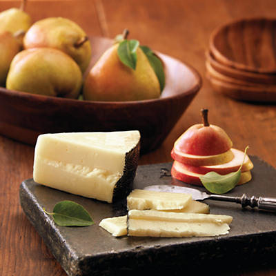 Imported from Spain and aged for three months, true Manchego cheese is creamy and nutty, popping with a slightly briny taste. This complex flavor makes it the perfect complement to our sweet, buttery 