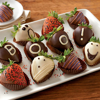 Our Halloween Hand-Dipped Chocolate-Covered Strawberries fruit gift starts with a dozen of the biggest, juiciest strawberries we could find. These berries are dipped by hand into Belgian chocolate and